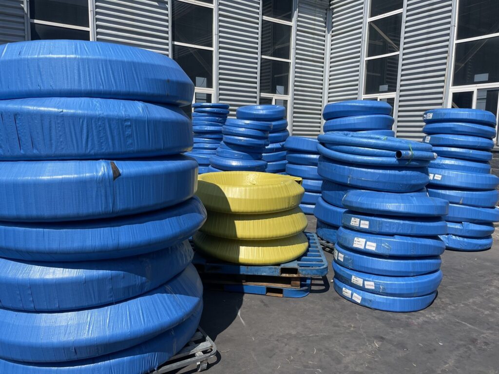 High-quality industrial hoses ready for on-time global shipment